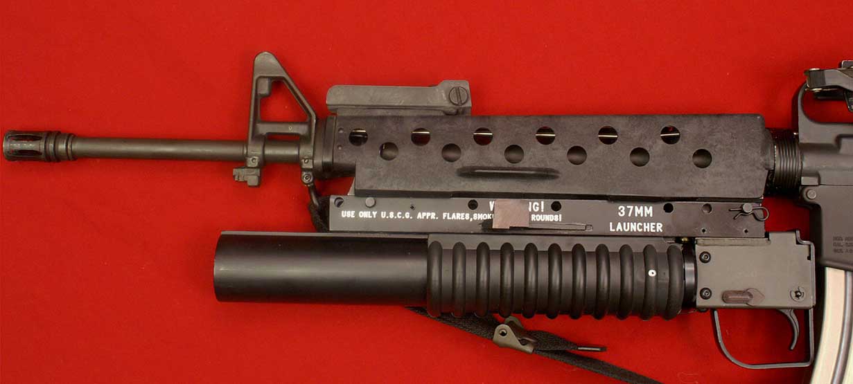 80's era rebuild A1 w/Cobray 37mm launcher